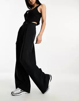 Черные широкие брюки со складками спереди ASOS DESIGN