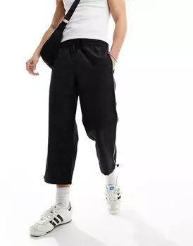 Черные широкие нейлоновые брюки с застежками ASOS DESIGN