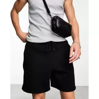 Черные шорты оверсайз из джерси с кнопками ASOS DESIGN
