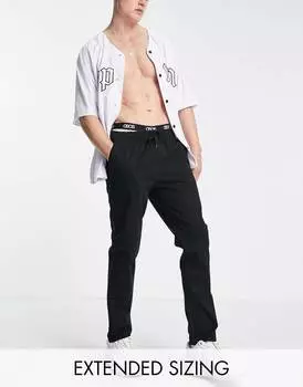 Черные узкие брюки чинос с эластичным поясом ASOS DESIGN