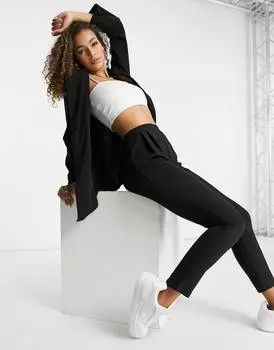 Черные зауженные брюки из джерси ASOS DESIGN