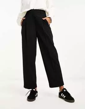 Черные зауженные брюки с отворотом на подоле ASOS