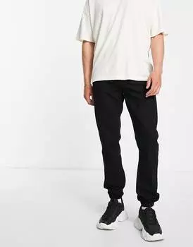 Черные зауженные джинсы с эластичным низом ASOS DESIGN