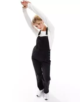 Черный джинсовый комбинезон ASOS DESIGN