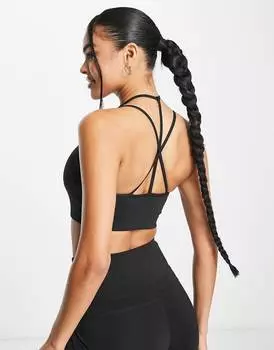 Черный спортивный бюстгальтер с легкой поддержкой на бретелях Puma Studio Granola