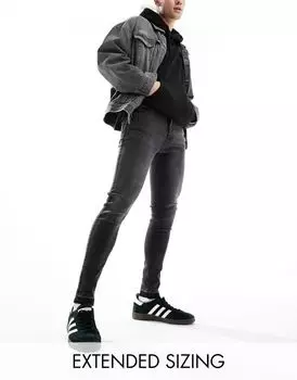 Черный спрей ASOS DESIGN на эластичных джинсах с свободным низом