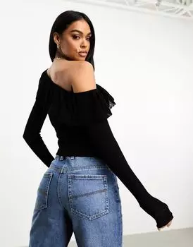 Черный вязаный свитер с асимметричной оборкой ASOS DESIGN