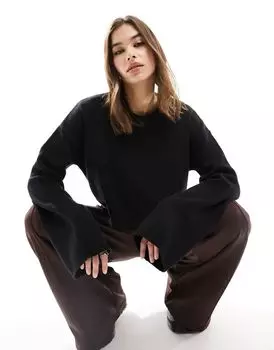 Черный вязаный укороченный топ с длинными рукавами Monki