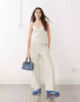 COLLUSION брюки-баллоны в желтую клетку