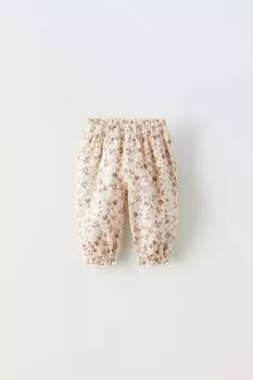 Цветочные брюки ZARA, светлый экрю