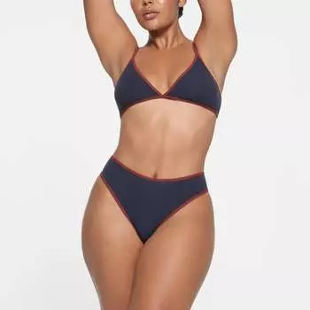 Дерзкие трусики с контрастной отделкой SKIMS, темно-синий