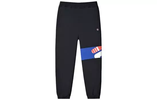 Детские спортивные штаны FILA, цвет черный
