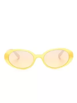 Dolce & Gabbana Eyewear солнцезащитные очки в овальной оправе с логотипом, желтый