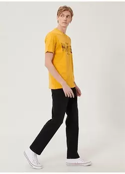 Джинсовые брюки Wrangler