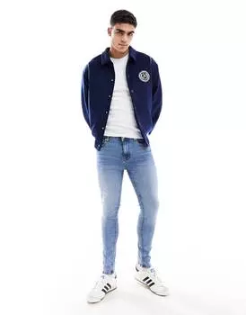 Джинсы Asos Design Spray With Power-stretch, светло-синий