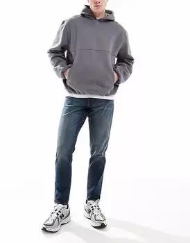 Джинсы ASOS DESIGN stretch tapered in mid wash blue