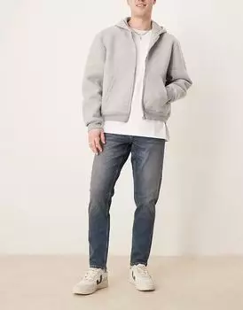 Джинсы ASOS DESIGN stretch tapered in mid wash blue