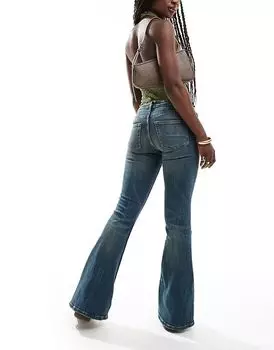 Джинсы Katsumi с заниженной талией и расклешенным кроем темно-синего цвета Monki