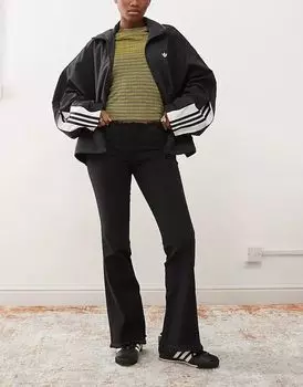 Джинсы-клеш с низкой посадкой, эластичные, черного цвета Monki