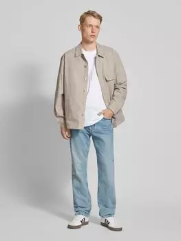 Джинсы прямого кроя с этикеткой Calvin Klein Jeans