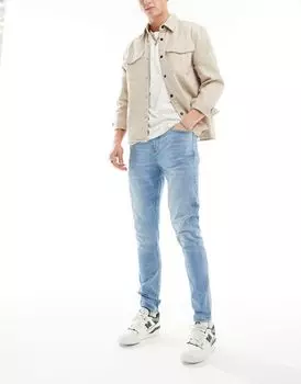 Джинсы скинни бледно-винтажного синего цвета ASOS DESIGN