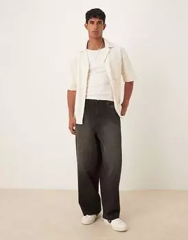 Джинсы свободного кроя ASOS DESIGN черного цвета с коричневым оттенком