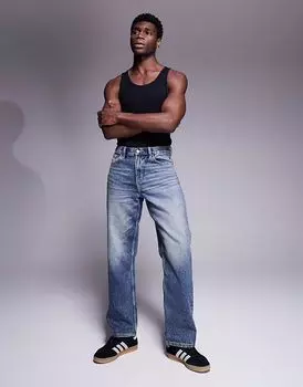 Джинсы свободного кроя ASOS DESIGN с винтажным оттенком, средне-синего цвета