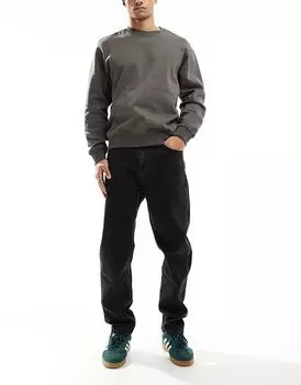 Джинсы Tommy Jeans Isaac slim fit черного цвета со свободным кроем