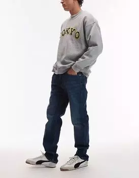 Джинсы Tommy Jeans Ryan Slim Straight темно-синего цвета