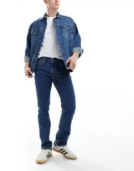 Джинсы узкого кроя Levi's 511 темно-синего цвета