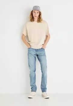 Джинсы зауженного кроя SLIM TAPER Levi's®, светло-голубой деним