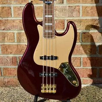 Fender 40th Anniversary Jazz Bass, Gold Edition, лавровая накладка на гриф, золотая анодированная накладка, рубиново-красный металлик 40th Anniversary Jazz Bass?, Gold Edition, Laurel Fingerboar...