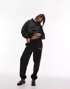 Флисовый джоггер черного цвета New Balance