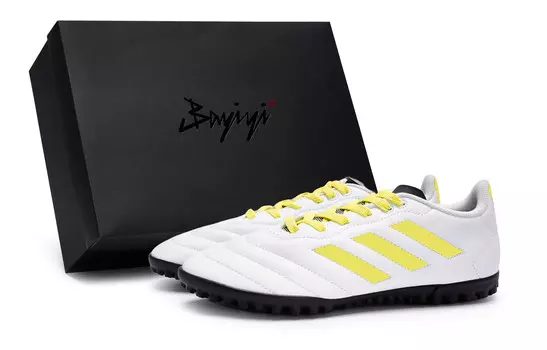 Футбольные бутсы GOLETTO VII унисекс с низким верхом желтый Adidas