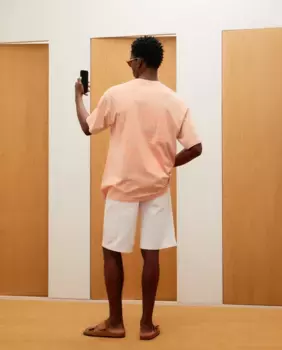 Футболка с коротким рукавом, крашенная в готовом виде + кислотная стирка, резиновый принт, позиционный Green Coast, оранжевый