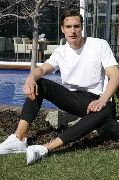 Футболка свободного кроя из 100% хлопка с круглым вырезом и одним карманом 5902505 Buratti, белый