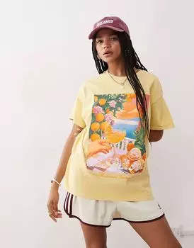 Футболка свободного покроя из хлопка Reclaimed Vintage с праздничным принтом желтого цвета