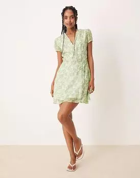 Гламурное мини-платье с V-образным вырезом и завязкой на талии в мелкий яблочно-зеленый цвет Glamorous