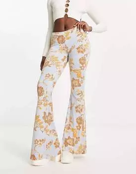 Голубые облегающие брюки-клеш с цветочным принтом Free People