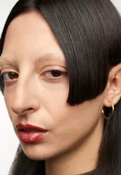 Губная помада Rouge Lvres Superlustrous Revlon, цвет 610 goldpearl plum