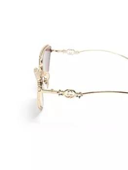Gucci Eyewear солнцезащитные очки в оправе 'кошачий глаз' с кристаллами, золотистый