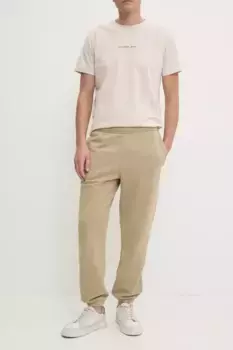 Хлопковые спортивные штаны Lacoste, бежевый