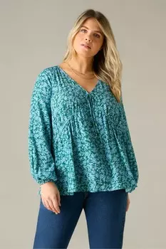 Изогнутая блузка с завязками на шее и мелким принтом Live Unlimited, синий