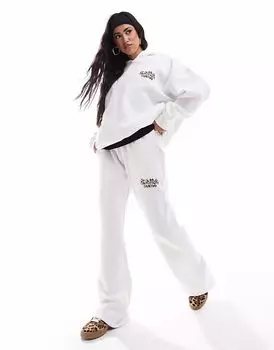 Эксклюзивные кремовые джоггеры с леопардовым принтом Kaiia