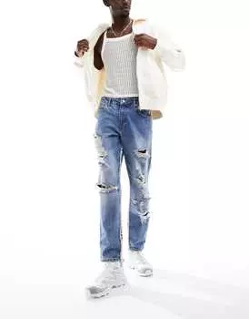 Классические синие жесткие джинсы с рваными краями ASOS DESIGN