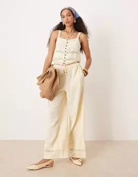 Комбинезон из жатых брюк River Island светло-желтого цвета