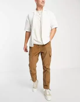 Коричневые вельветовые брюки карго зауженного кроя ASOS DESIGN