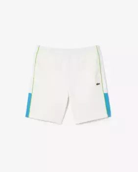 Короткие мужские двусторонние брюки из пике белого цвета Lacoste