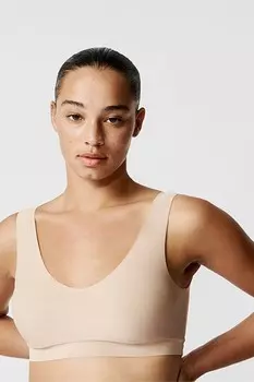 Короткий бесшовный бюстгальтер без косточек с V-образным вырезом из мягкой эластичной ткани Chantelle, белый