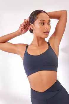 Короткий и очень мягкий спортивный бюстгальтер на тонких бретелях Next, серый